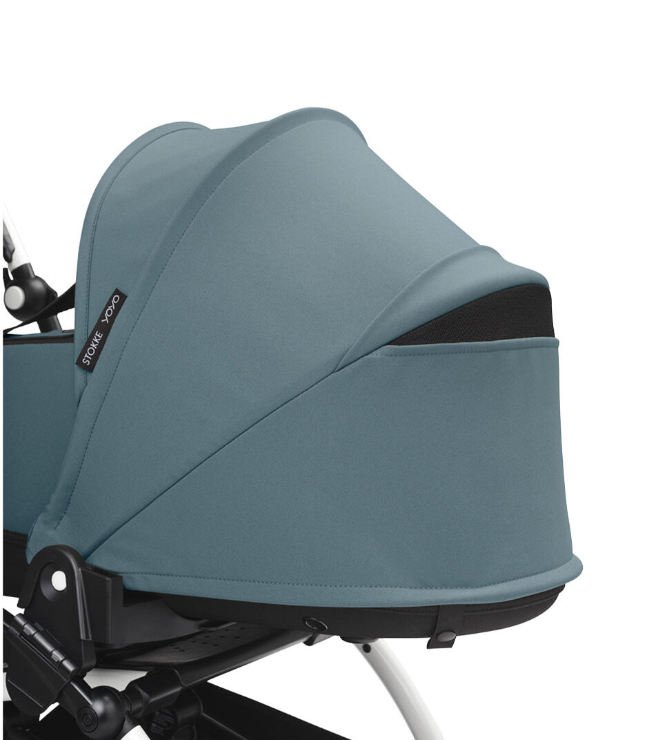 Stokke® YOYO3® Newborn Shell, Aqua. White Frame. Canopy ventilation open, close-up.
 galery image 4